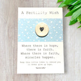A Fertility Wish Ceramic Wish Token and Card