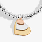 A Little 'Three Generations' Bracelet In Silver, Gold, And Rose Gold Plating