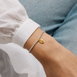 A Little 'Life Is Tough But So Are You' Bracelet In Silver and Gold Plating